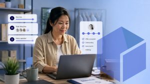 An HR manager reviewing new hire onboarding progress on a laptop, showing steps like offer accepted, onboarding, documents and training